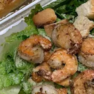 Grilled shrimps Caesar salad